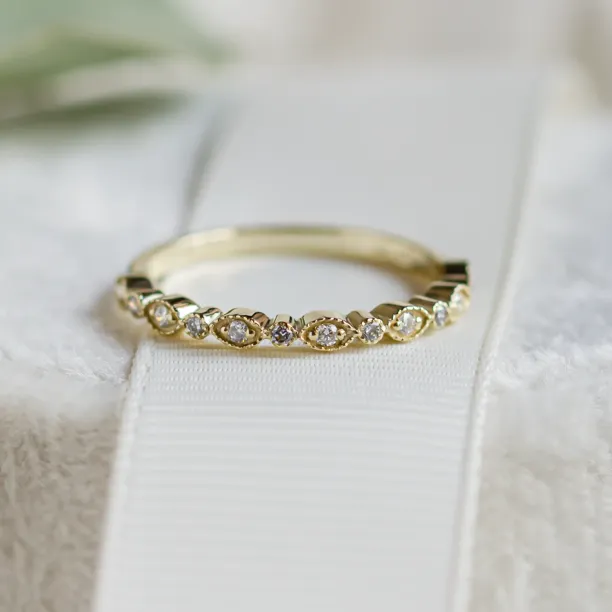 Unusual wedding rings with diamonds in vintage style LAZZI Image
