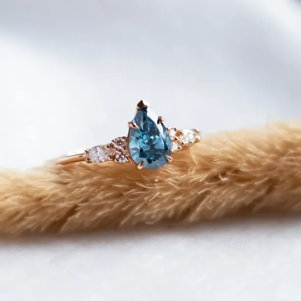 Gold ring with pear blue lab grown diamond and side diamonds AZURE Image