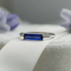 Gold ring with baguette blue lab grown sapphire and diamonds ODETA Thumbnail