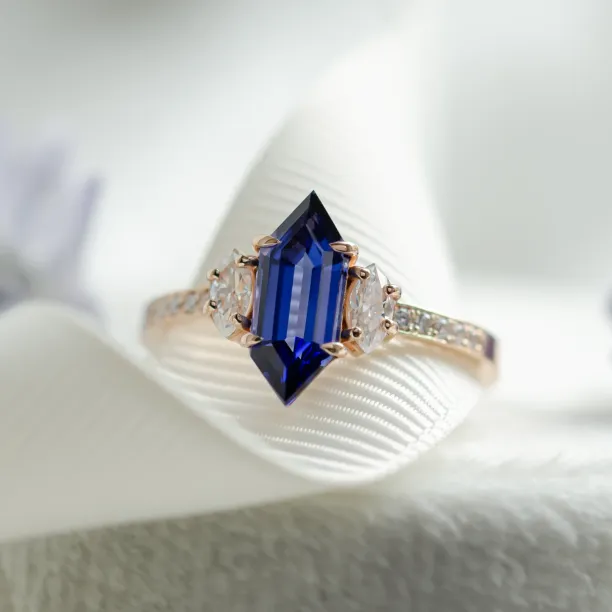 Ring with blue lab grown sapphire and moissanites ELLIS Image