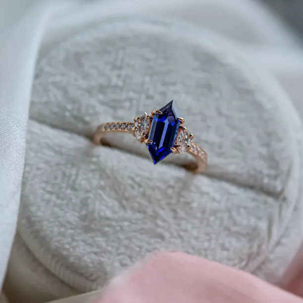 Ring with blue lab grown sapphire and moissanites ELLIS Image