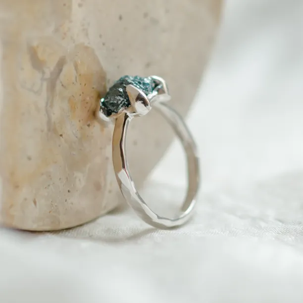 Gold ring with blue raw diamond and hammered surface SEA Image