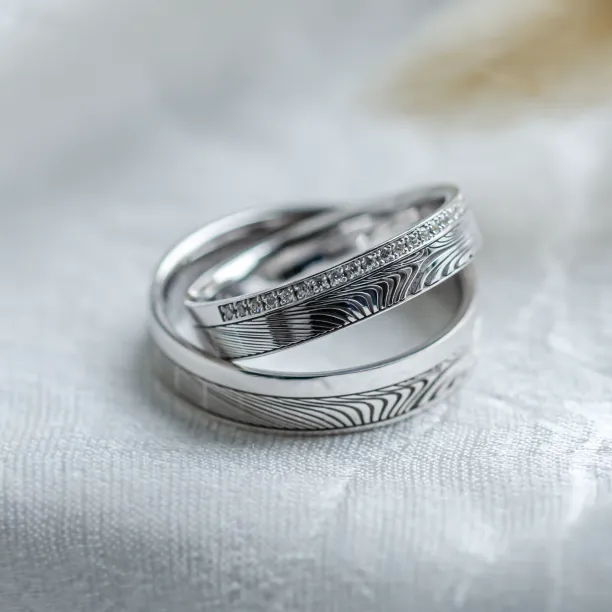 Original wedding rings with relief and diamonds PEACOCK Image