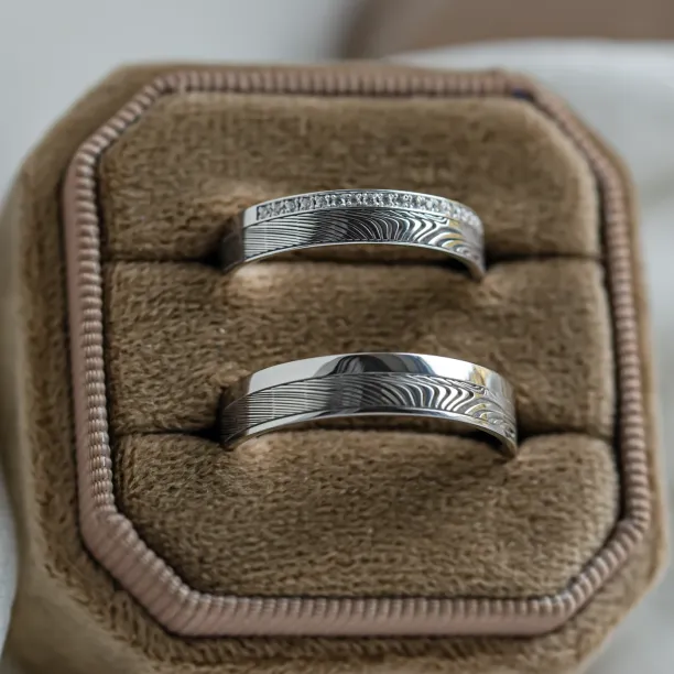 Original wedding rings with relief and diamonds PEACOCK Image