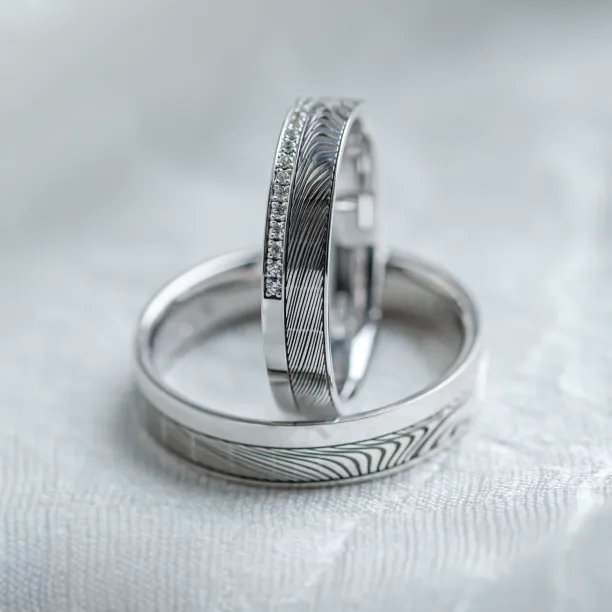 Original wedding rings with relief and diamonds PEACOCK Image