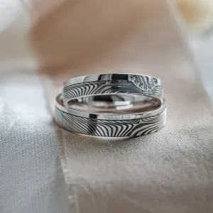 Wedding rings with abstract relief and diamonds OMEGA Thumbnail
