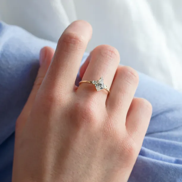 Elegant engagement ring with kite moissanites DOMPHI Image