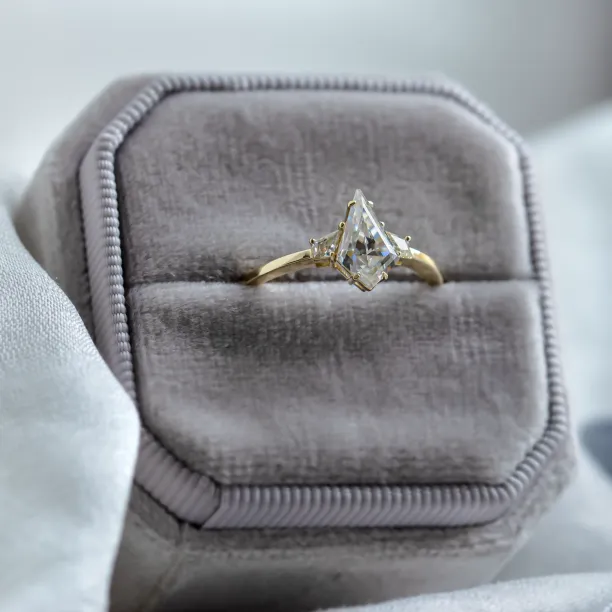 Elegant engagement ring with kite moissanites DOMPHI Image