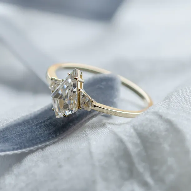 Elegant engagement ring with kite moissanites DOMPHI Image
