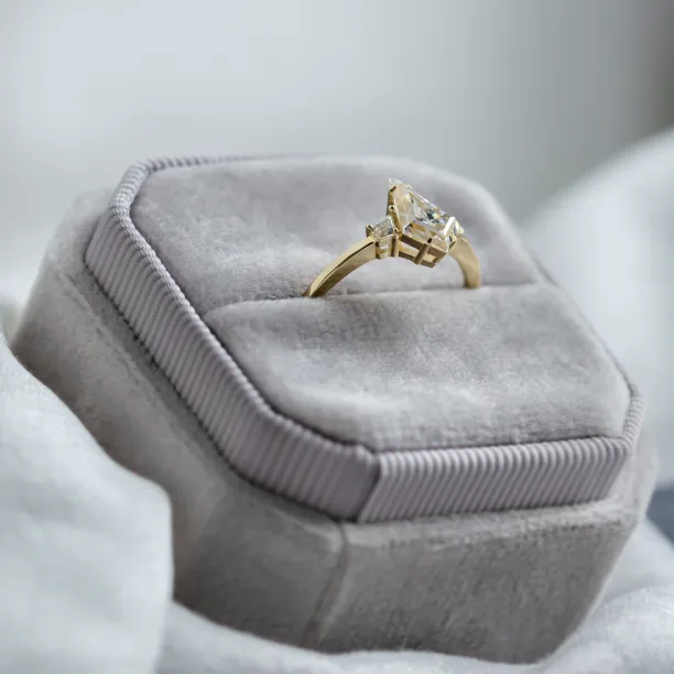 Elegant engagement ring with kite moissanites DOMPHI Image