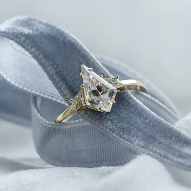 Elegant engagement ring with kite moissanites DOMPHI Image