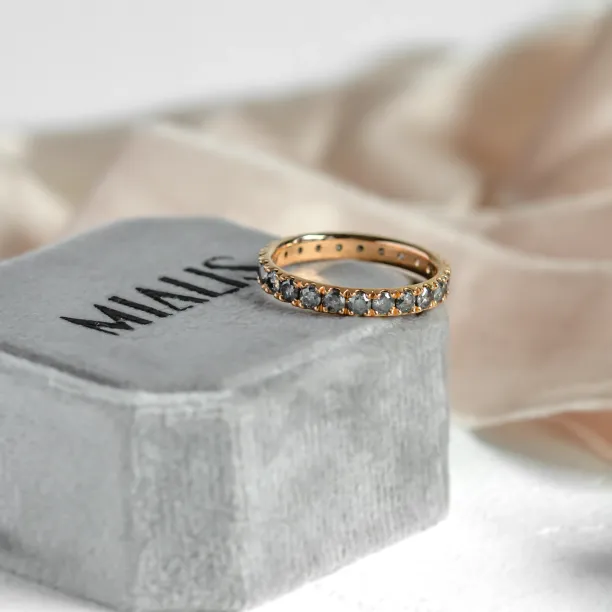 Gold eternity ring with salt and pepper diamonds LAVA Image