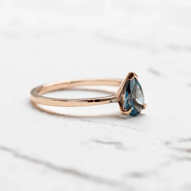 Gold ring with london blue topaz DROP Image