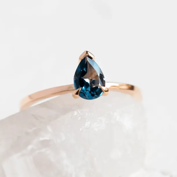 Gold ring with london blue topaz DROP Image