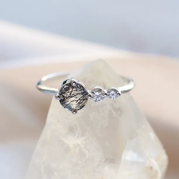 Gold ring with rutilated quartz and diamonds QUIDO Image