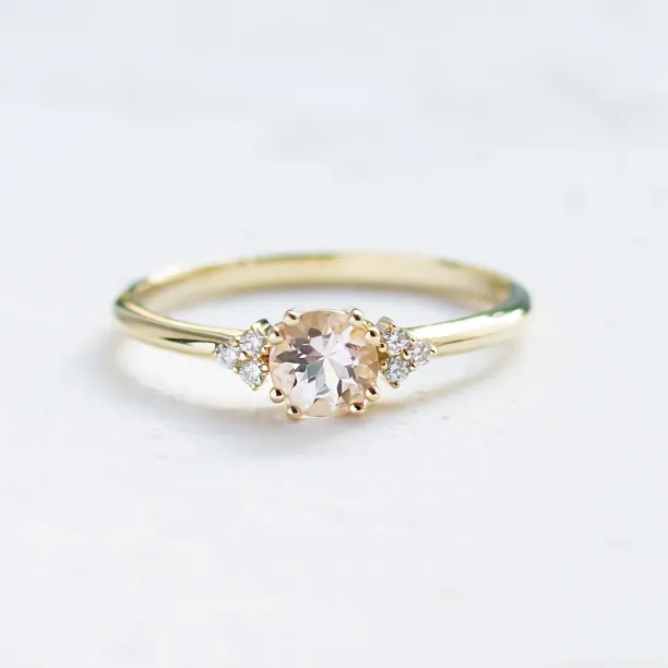 Romantic engagement ring with morganite and diamonds MONYX Image