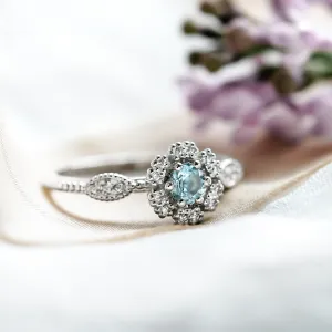 Halo engagement ring with aquamarine and diamonds CALI Thumbnail