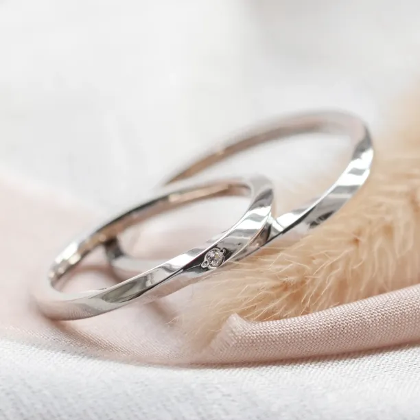 Elegant twisted wedding rings with diamond TWIST Image