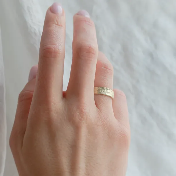 Unusual moon surface wedding bands LUNARIUM Image