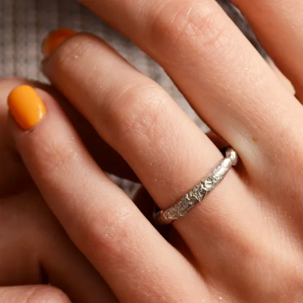 Gold wedding bands with moon surface APOLLO Image