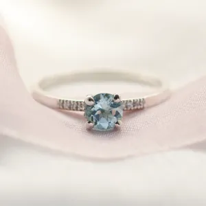 Blue topaz in gold ring with diamonds GINEVRA