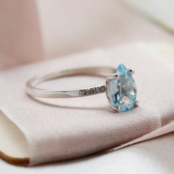 Engagement ring with blue topaz and diamonds SOFIA Image