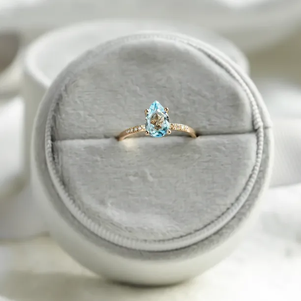 Engagement ring with blue topaz and diamonds SOFIA Image