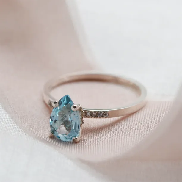 Engagement ring with blue topaz and diamonds SOFIA Image