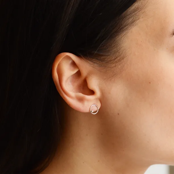 Gold karma earrings with diamonds GARURASANA Image