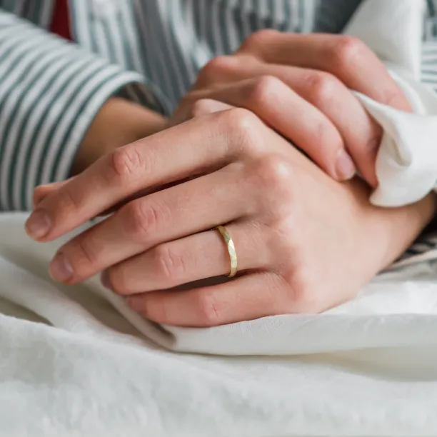 Matte gold wedding bands with hammered surface ETAIN Image