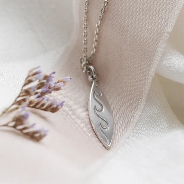 Gold pendant with engraving of waves BALI Image