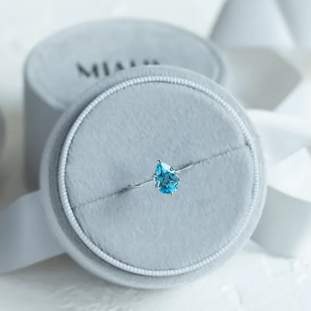 Gold ring with blue topaz OLLY Image