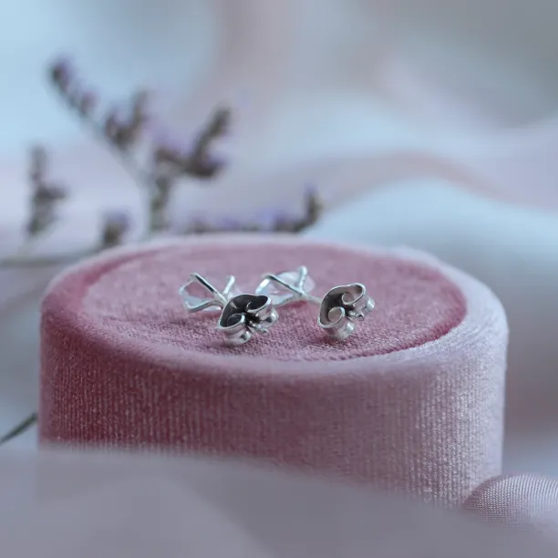 Gold earrings with white topazes FELI Image