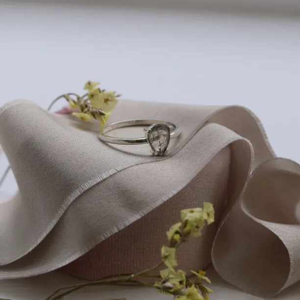 Gold ring with pear cut salt and pepper diamond Image