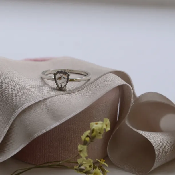 Gold ring with pear cut salt and pepper diamond Image