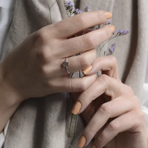 Gold ring with pear cut salt and pepper diamond Image