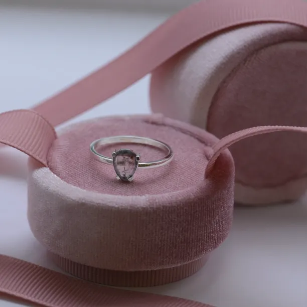 Gold ring with pear cut salt and pepper diamond Image