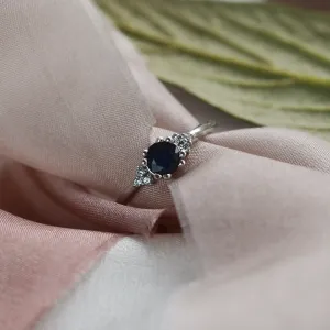 Gold ring with round sapphire and diamonds MONNY Thumbnail