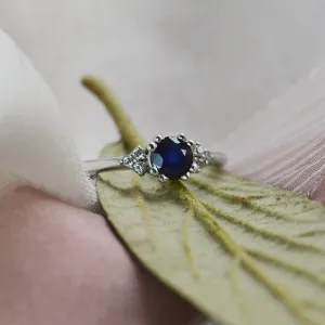 Gold ring with round sapphire and diamonds MONNY Thumbnail