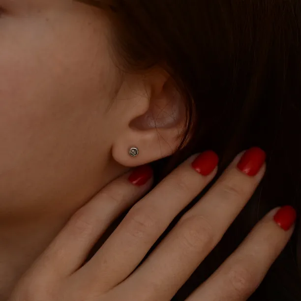 Minimalist gold earrings with salt and pepper diamonds LOLI Image