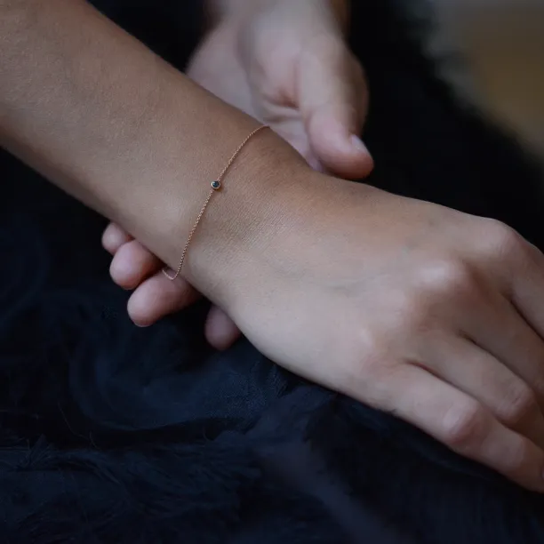 Gold bracelet with a black diamond BALA Image