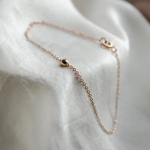 Gold bracelet with a black diamond BALA Image