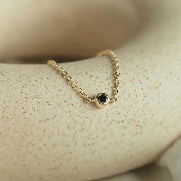Gold bracelet with a black diamond BALA Image
