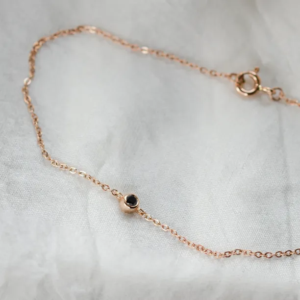 Gold bracelet with a black diamond BALA Image