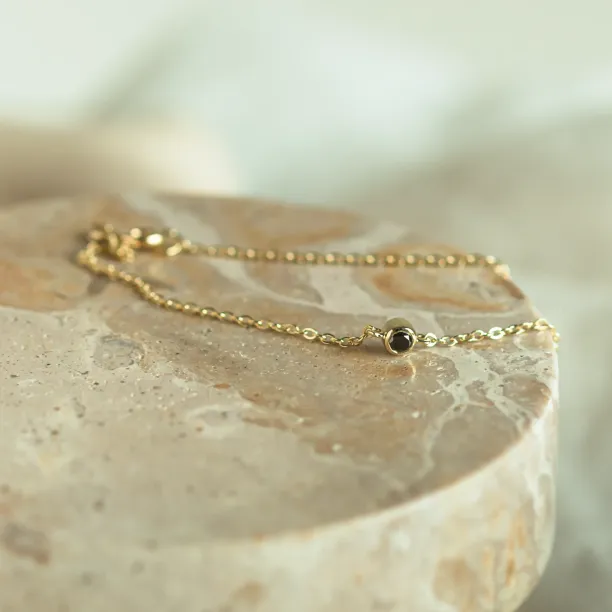Gold bracelet with a black diamond BALA Image