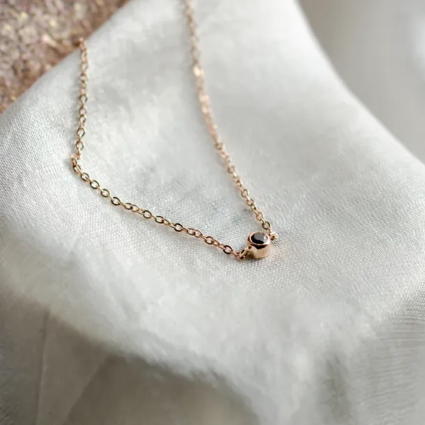 Gold bracelet with a black diamond BALA Image