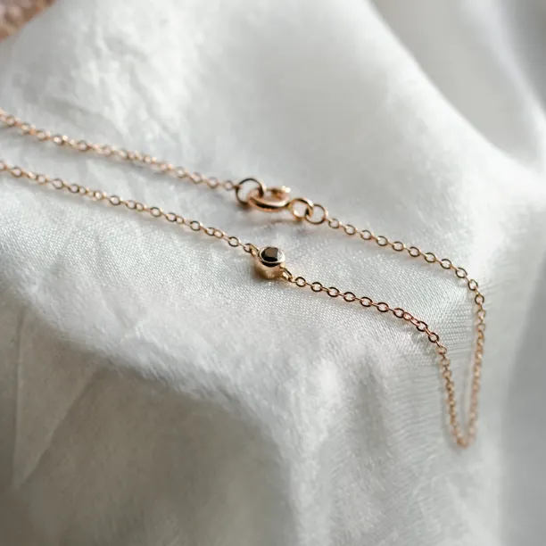 Gold bracelet with a black diamond BALA Image