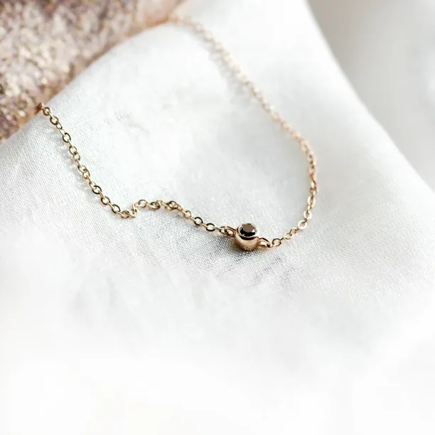 Gold bracelet with a black diamond BALA Image