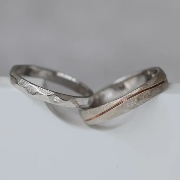 Gold wedding rings with a diamond SILA Image