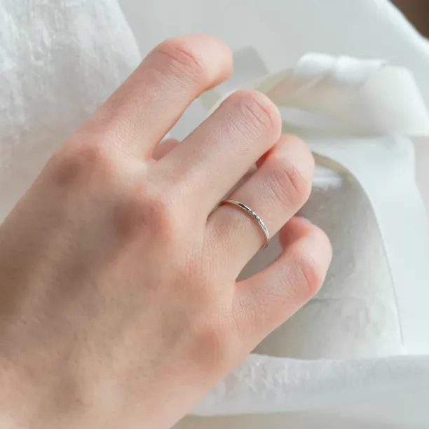 Gold minimalist ring with salt and pepper diamonds OLU Image